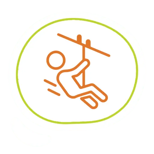 Adventurer ziplining through lush Monteverde rainforest